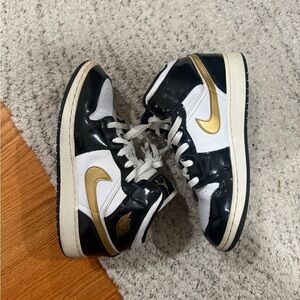 Nike Black and Gold Jordan 1 Mid